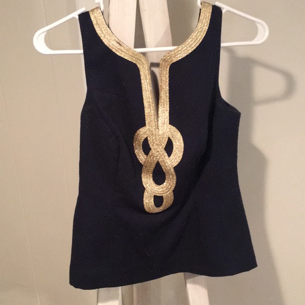 Navy+Gold embellished V neck top. Scoop back